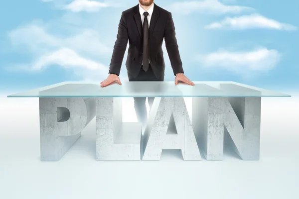 Confident business man leaning on PLAN table on sky backrgound. Bussines concept — стокове фото