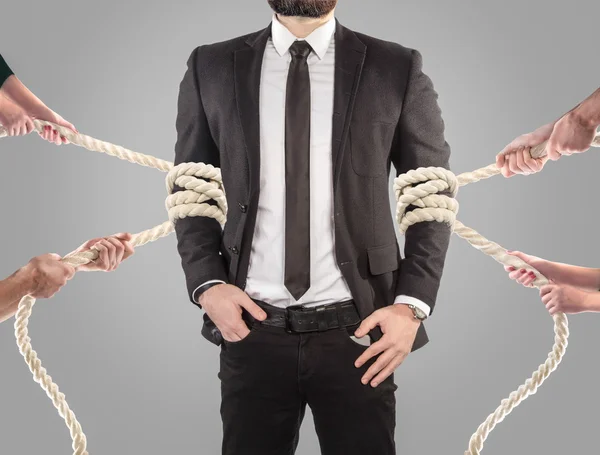 Hands of people pulling the rope on white background. Search employee concept — Stock fotografie