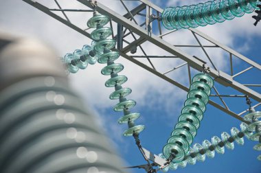 Nur-Sultan, Kazakhstan - 05.28.2015 : High-voltage power lines with insulators, stabilizers and transformers.