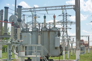 Nur-Sultan, Kazakhstan - 05.28.2015 : High-voltage power lines with insulators, stabilizers and transformers.