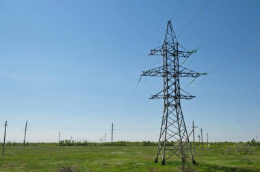 Nur-Sultan, Kazakhstan - 05.28.2015 : High-voltage power lines with insulators, stabilizers and transformers.