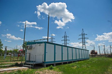 Nur-Sultan, Kazakhstan - 05.28.2015 : High-voltage power lines with insulators, stabilizers and transformers.