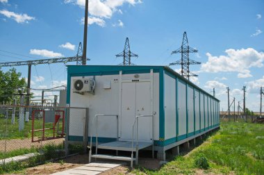 Nur-Sultan, Kazakhstan - 05.28.2015 : High-voltage power lines with insulators, stabilizers and transformers.