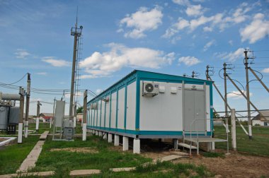 Nur-Sultan, Kazakhstan - 05.28.2015 : High-voltage power lines with insulators, stabilizers and transformers.