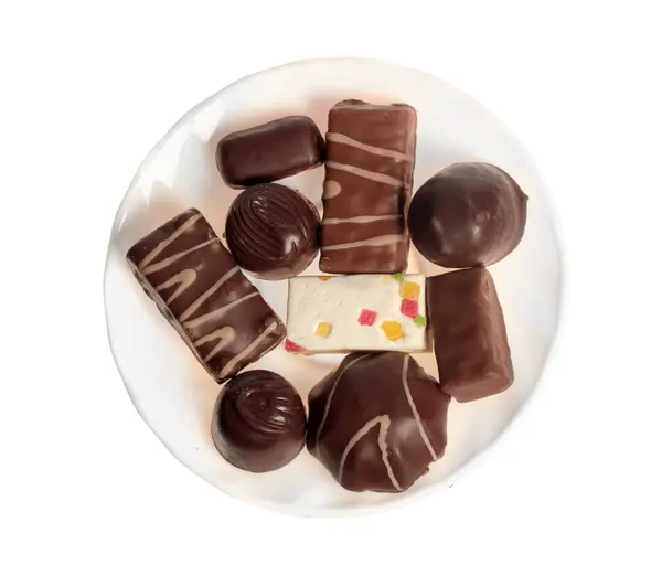 Chocolate sweets in the plate — Stock Photo, Image