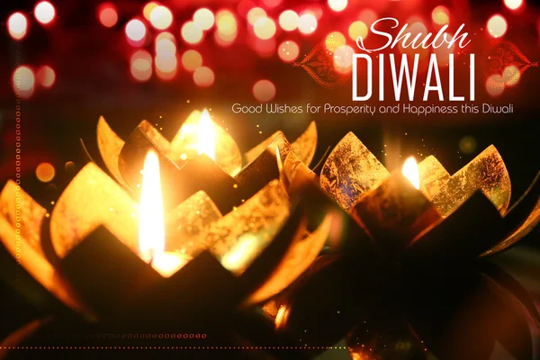 Golden lotus shaped diya on abstract Diwali background — Stock Photo, Image