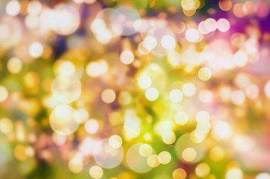 Renk Festivali 'nin arka planında doğal bokeh ve parlak altın ışıklarla sihirli arka plan. Klasik Sihirli arkaplan