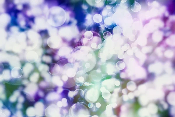 Magische achtergrond met kleur Feestelijke achtergrond met natuurlijke bokeh en heldere gouden lichten. Vintage magische achtergrond — Stockfoto