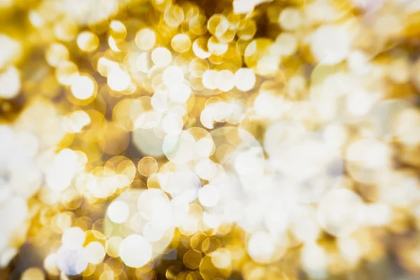 Magic Background With Color Festive background with natural bokeh and bright golden lights. Vintage Magic background