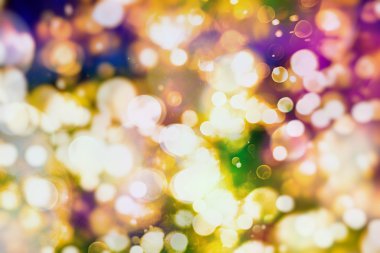 Renk Festivali 'nin arka planında doğal bokeh ve parlak altın ışıklarla sihirli arka plan. Klasik Sihirli arkaplan