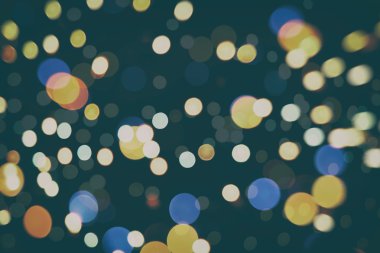 Festival arka plan. Glitter vintage ışıklar arka ışıklı defocused.