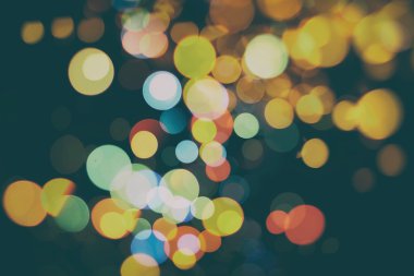 Festival arka plan. Glitter vintage ışıklar arka ışıklı defocused.
