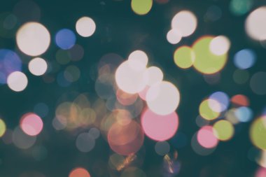 Festival arka plan. Glitter vintage ışıklar arka ışıklı defocused.