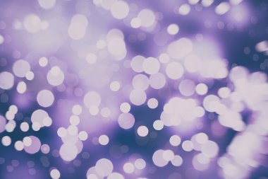 Festival arka plan. Glitter vintage ışıklar arka ışıklı defocused.