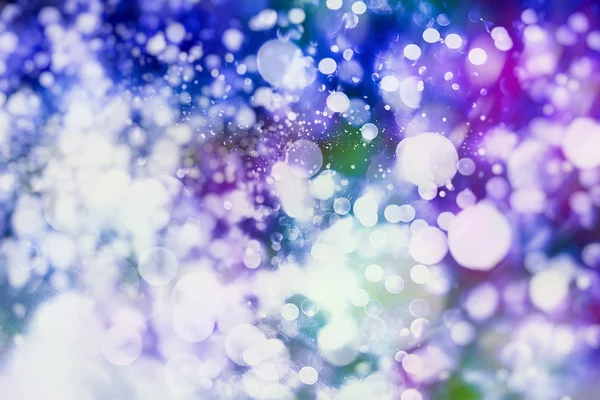 Abstrakt festliga bakgrund. Glitter vintage ljus bakgrund med ljus defocused. — Stockfoto