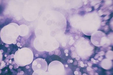 Festival arka plan. Glitter vintage ışıklar arka ışıklı defocused.