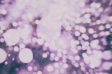 Festival arka plan. Glitter vintage ışıklar arka ışıklı defocused.