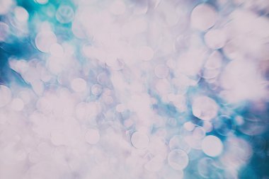 Festival arka plan. Glitter vintage ışıklar arka ışıklı defocused.