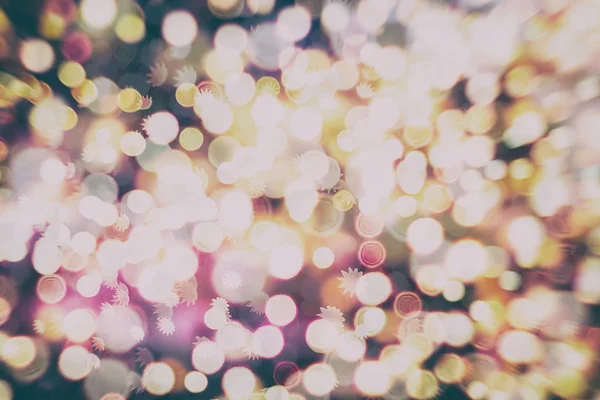 Resumo Fundo festivo. Glitter vintage luzes de fundo com luzes desfocadas . — Fotografia de Stock