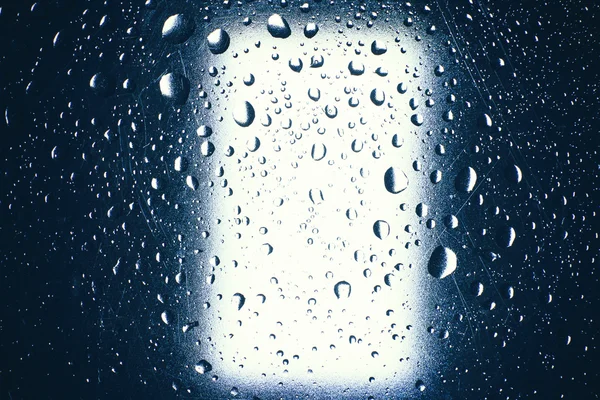 Gotas de lluvia en la ventana. gotas de lluvia de agua en ventana de vidrio — Foto de Stock