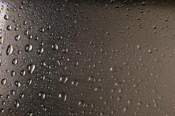 Tetes hujan di jendela. air hujan tetes di jendela kaca — Stok Foto