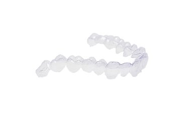 Close-up individual tooth tray Orthodontic dental theme. Invisible braces