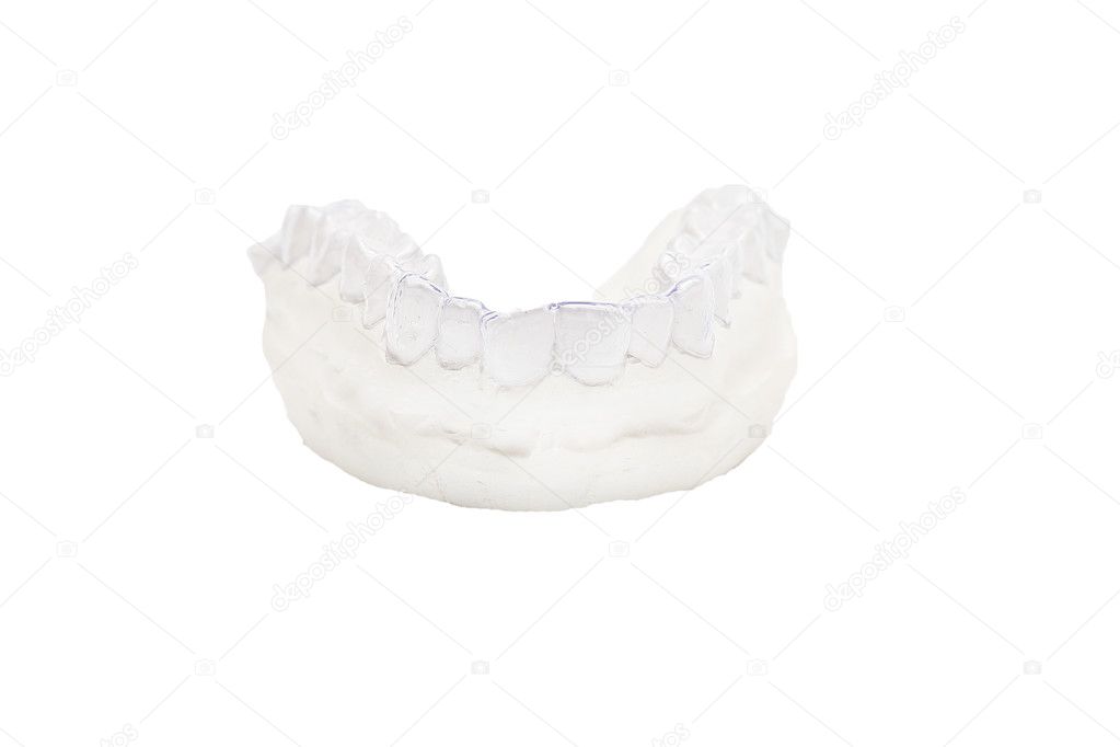 Close-up individual tooth tray Orthodontic dental theme. Invisible braces