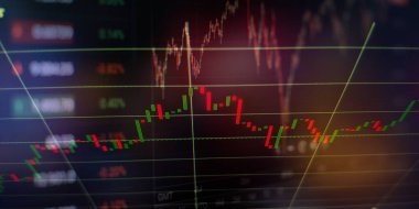 Grafikler ve dijital numara ekrana veriliyor. Borsa eğilimini temsil edecek altın ve mavi dijital grafiğin arkaplanı.