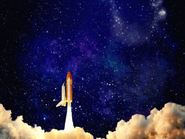 Roket fırlatıldı. Dumanlı roket uzaya uçar. Uzay mekiği. Uzay gemisi göreve başlıyor. Bu görüntünün elementleri NASA tarafından desteklenmektedir