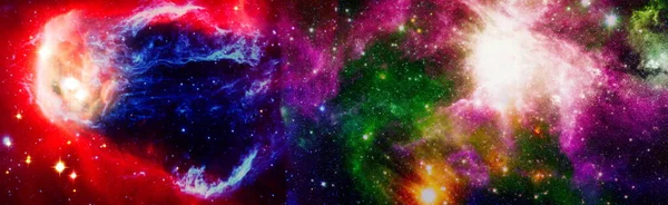 Nebula night starry sky in rainbow colors. Multicolor outer space. Star field and nebula in deep space many light years far from planet Earth. Elements of this image furnished by NASA.