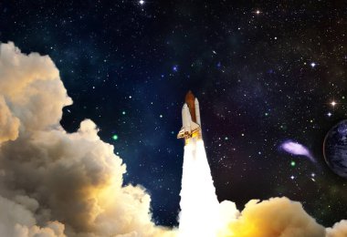 Roketler yıldızlı gökyüzünde uzaya fırlatılıyor. Roket uzay kavramına başlıyor. NASA tarafından desteklenen bu görüntünün elementleri