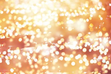 Doğal Bokeh ve parlak altın ışık şenlikli arka plan. Vintage sihirli arka plan rengi ile