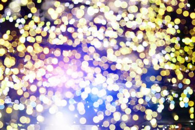 Doğal Bokeh ve parlak altın ışık şenlikli arka plan. Vintage sihirli arka plan rengi ile