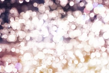 Doğal Bokeh ve parlak altın ışık şenlikli arka plan. Vintage sihirli arka plan rengi ile