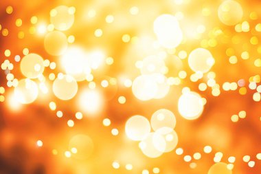 Doğal Bokeh ve parlak altın ışık şenlikli arka plan. Vintage sihirli arka plan rengi ile