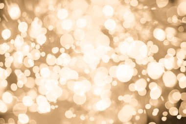 Doğal Bokeh ve parlak altın ışık şenlikli arka plan. Vintage sihirli arka plan rengi ile