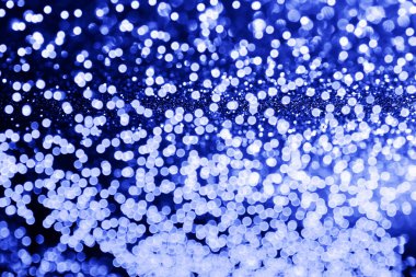 Doğal Bokeh ve parlak altın ışık şenlikli arka plan. Vintage sihirli arka plan rengi ile