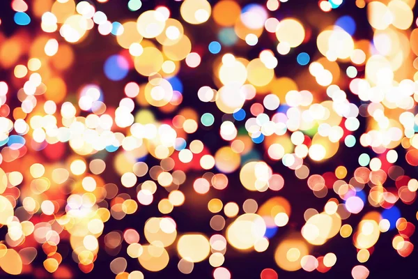 Doğal Bokeh ve parlak altın ışık şenlikli arka plan. Vintage sihirli arka plan rengi ile
