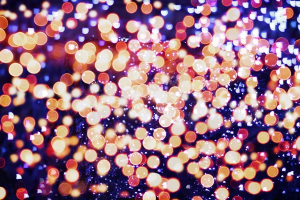 Festlicher Hintergrund mit natürlichem Bokeh und leuchtend goldenen Lichtern. Vintage magischen Hintergrund mit Farbe — Stockfoto