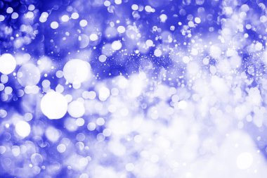 Bokeh ışıkları ve yıldız desenli şenlikli soyut arkaplan