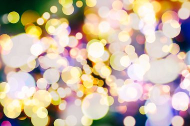 Bokeh ışıkları ve yıldız desenli şenlikli soyut arkaplan