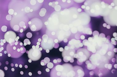 Bokeh ışıkları ve yıldız desenli şenlikli soyut arkaplan