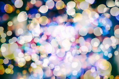 Bokeh ışıkları ve yıldız desenli şenlikli soyut arkaplan