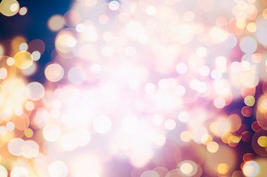 Bokeh ışıkları ve yıldız desenli şenlikli soyut arkaplan