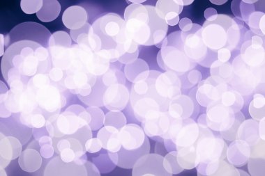 Bokeh ışıkları ve yıldız desenli şenlikli soyut arkaplan