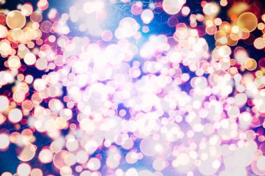 Bokeh ışıkları ve yıldız desenli şenlikli soyut arkaplan