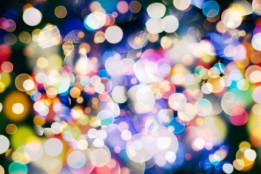 Bokeh ışıkları ve yıldız desenli şenlikli soyut arkaplan