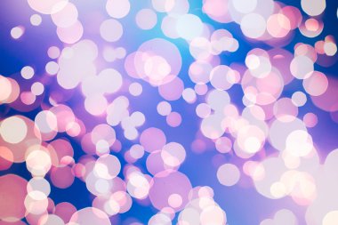 Bokeh ışıkları ve yıldız desenli şenlikli soyut arkaplan