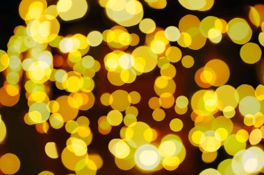 Bokeh ışıkları ve yıldız desenli şenlikli soyut arkaplan