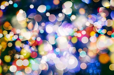 Bokeh ışıkları ve yıldız desenli şenlikli soyut arkaplan